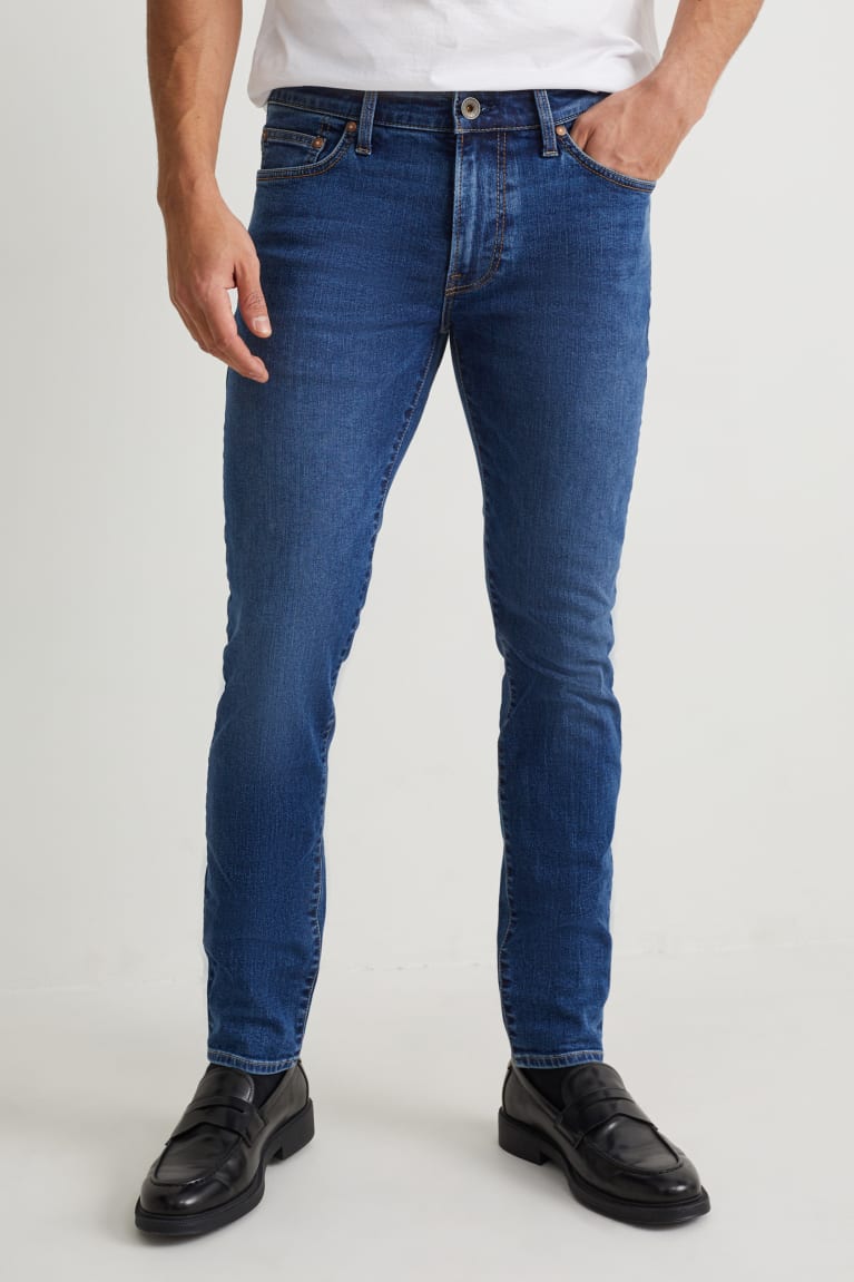 Calça Jeans C&A Magro Lycra® Masculino Azuis | 71824BGXR