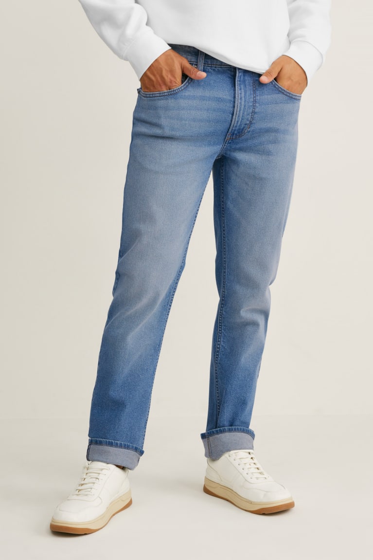 Calça Jeans C&A Slim Lycra® Masculino Azuis Luz Azuis | 50467XVMB