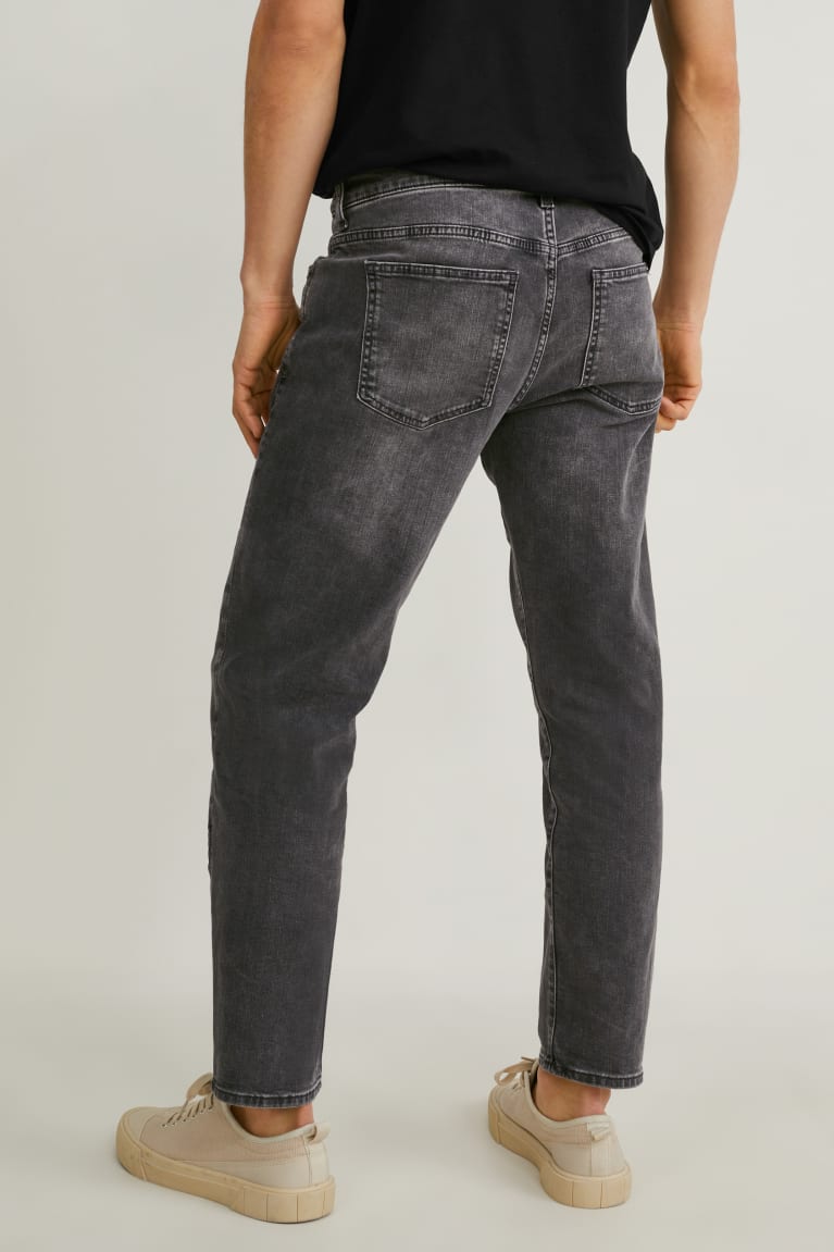 Calça Jeans C&A Tapered Lycra® Masculino Pretas | 59628YNKW