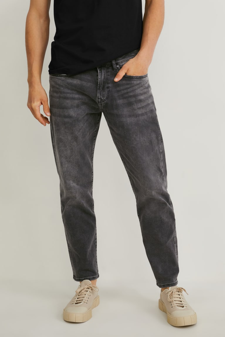 Calça Jeans C&A Tapered Lycra® Masculino Pretas | 59628YNKW