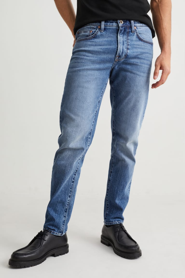 Calça Jeans C&A Tapered Lycra® Masculino Azuis | 87043ZOJN